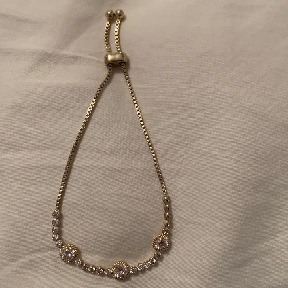 Gold colored bolo bracelet